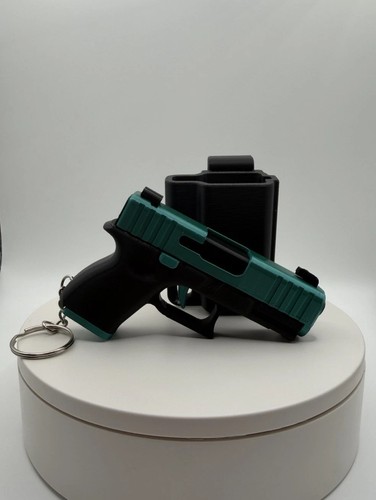 Mini pistol style keychain - pistol,